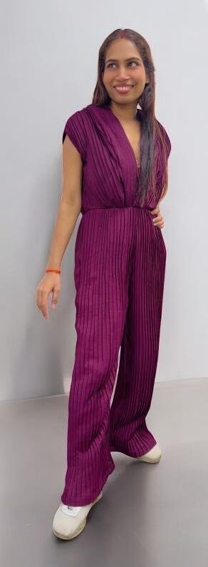 Student project purple pleated jumpsuit