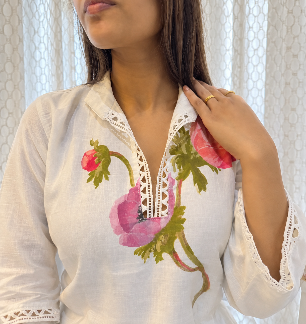 Embroidered cream outfit detail student project
