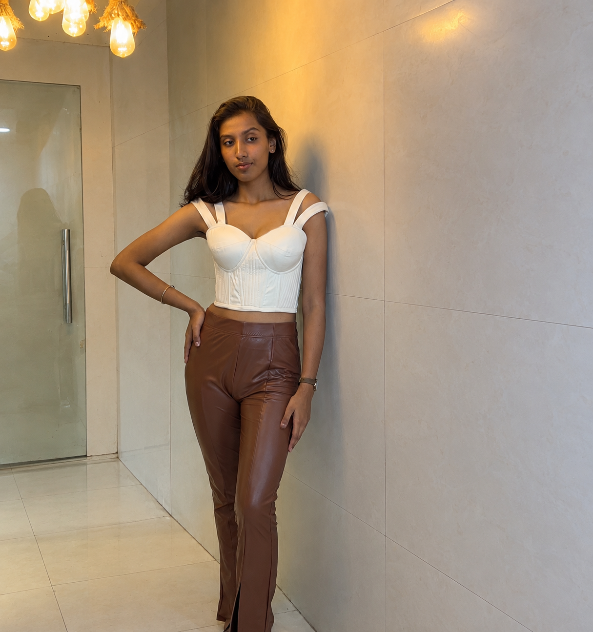 White top and brown trousers front student project